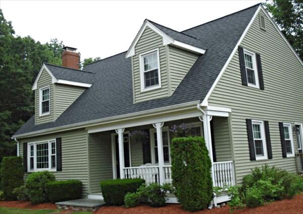 Cape-style home with new asphalt shingle roof
