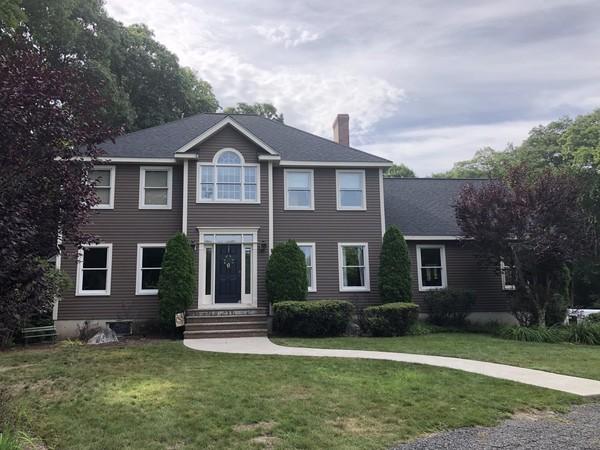 Colonial home with new siding